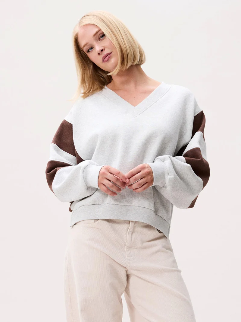Grijze v-hals sweater
