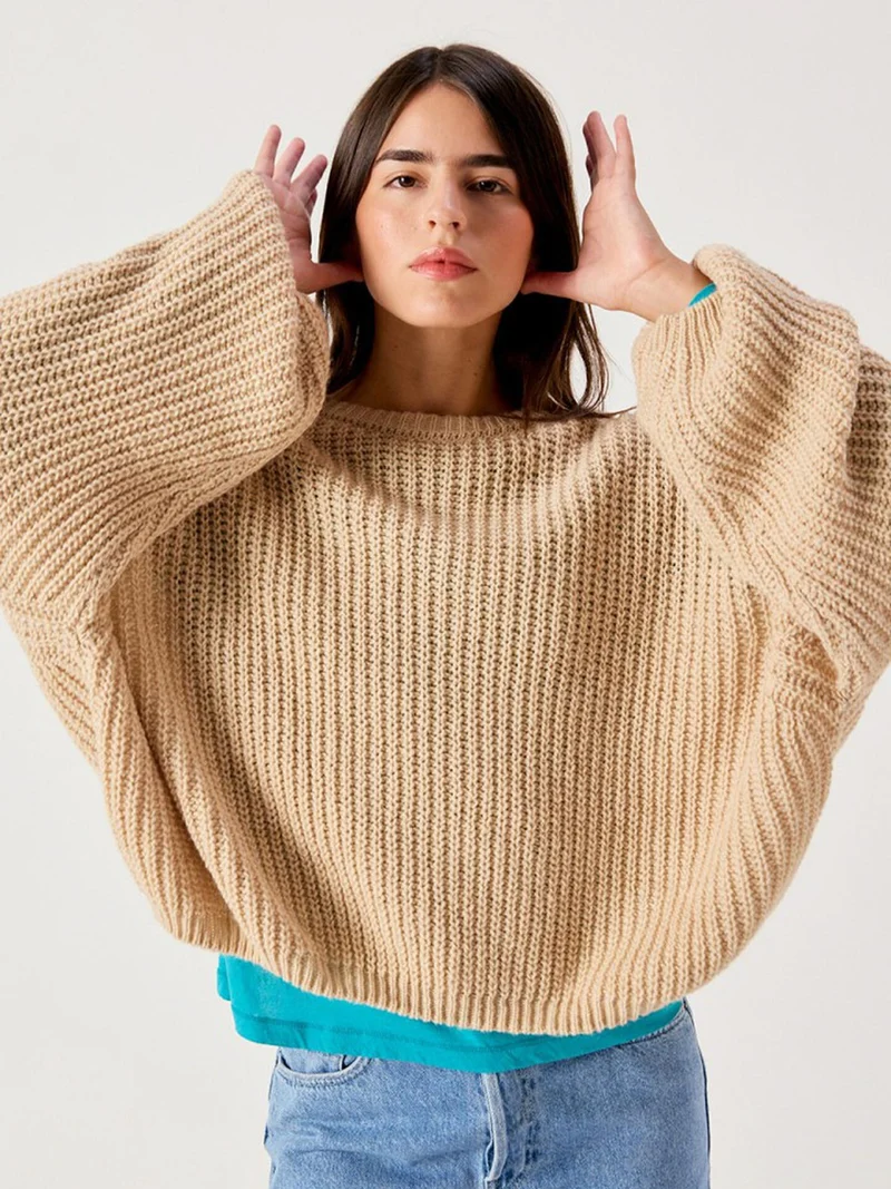 Beige gebreide trui cyrow