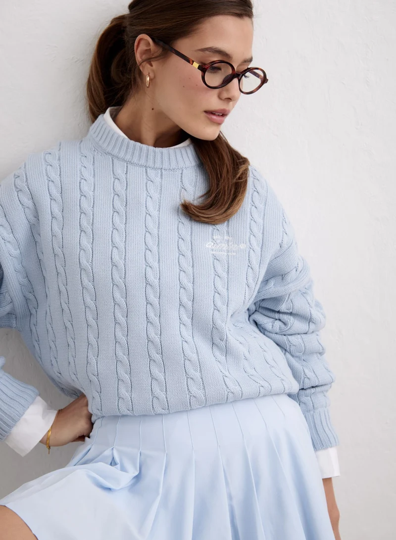 Aura Club Cable Knit Sweater
