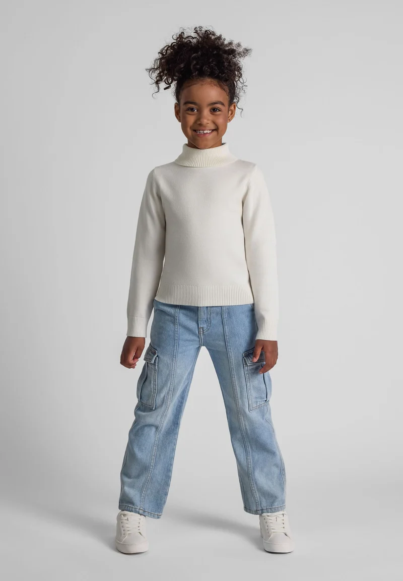 Girls' high neck jumper in cream