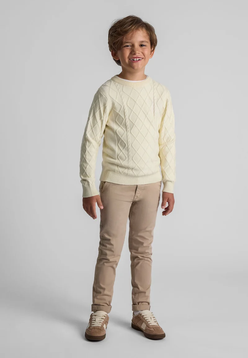Boys' cable knit jumper in cream