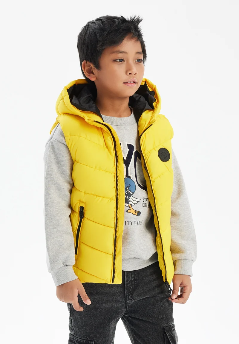 Boys' padded gilet in yellow