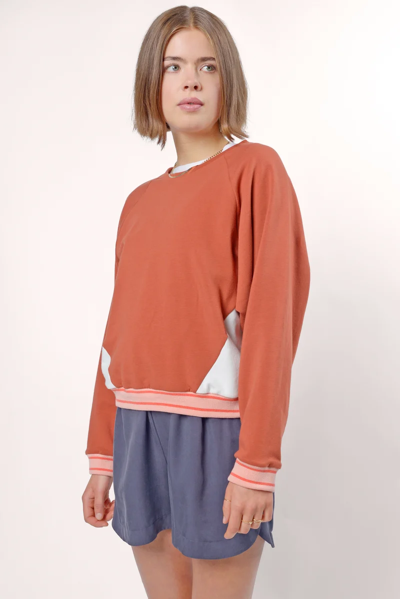 Sportieve oranje sweater met wijde mouw | UVR Berlin FE renjaina