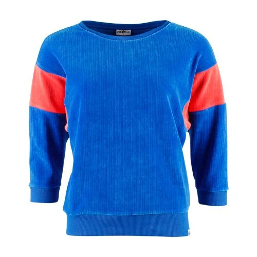Chills and Fever sweater ona blue velvet