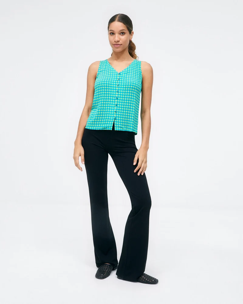 Surkana V-neckline top with straps and buttons blue