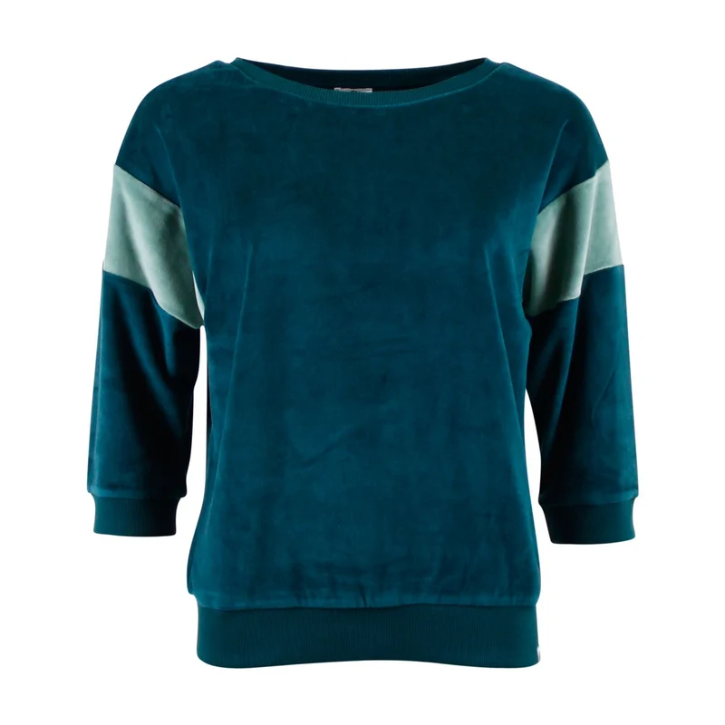Chills and Fever sweater ona velvet deep teal