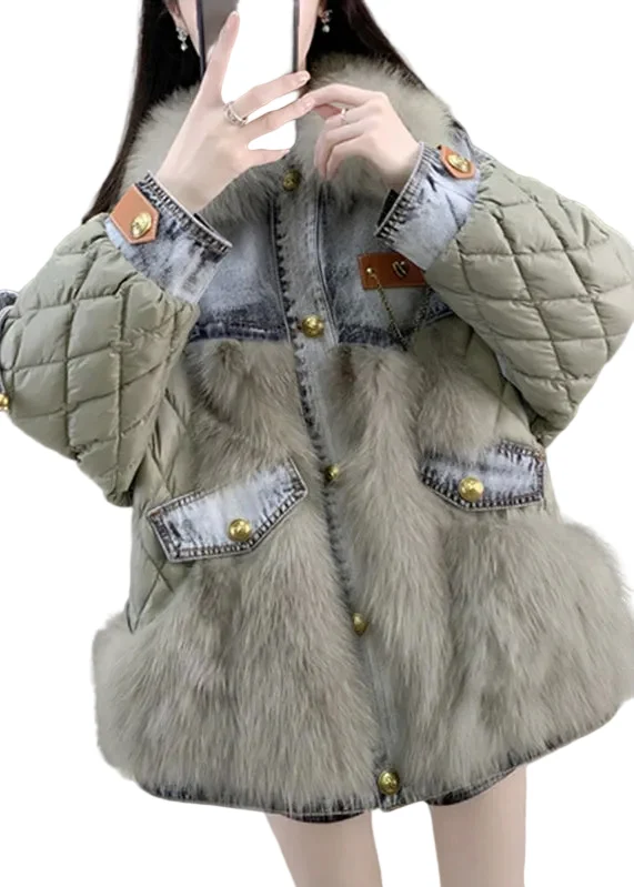 Dameswinterjas met vossenbontkraag en patchworkdesign voor een casual look.